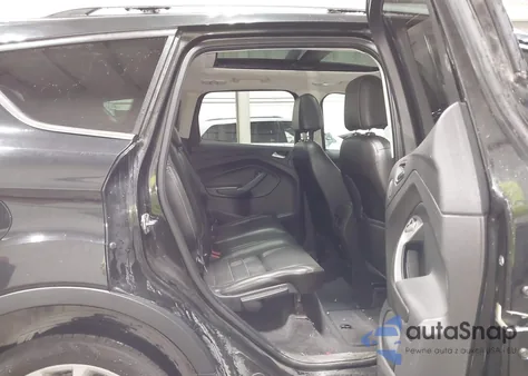 2014 Ford Escape Titanium z USA, uszkodzony, nr VIN 1FMCU9J95EUA18704